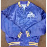 A late 20th Century Chalk Line Minnesota Vikings NFL American football jacket in purple with