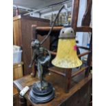 A vintage Art Nouveau bronze finished figure table lamp with a glass shade on a wooden base, 53cm