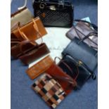 A group of 11 vintage handbags to include a Danbury Mint bag, crocodile and ostrich bags, mainly mid