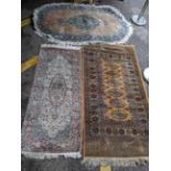 Three rugs to include a Middle Eastern yellow ground rug with geometric designs and tasselled ends