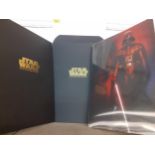 Two folios of Star Wars Classic Movie Posters, 24 in total, 42cm x 30cm, together with a Morphing