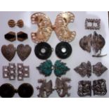 A collection of vintage buckles to include early 20th Century examples, a turquoise cloisonne