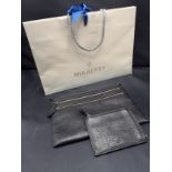 Mulberry-A black natural grain leather multizip pouch having branded lining and 4 exterior zipped
