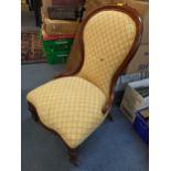 A Victorian mahogany spoon back chair having a serpentine front and reeded legs together with a