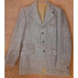 A Dunn & Co Harris Tweed blazer with leather buttons, 38"chest x 30" long.Location:Rail1 Condition: