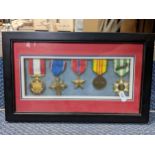 Five medals to include a Republic of Vietnam service medal, mounted and glazed in a frame