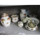 A group of Royal Albert Country Roses to include a telephone, a pair of cache pots, a pot and