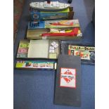 A group of toys and board game to include Scalex Boats model of RMS Pretoria Castle Ocean liner, a