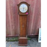 A 1930s oak 8 day granddaughter clock, 131h x 26.5w