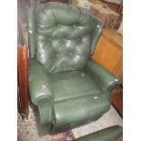 Two Sherbourne Ti Motion electric reclining armchairs, upholstered in green button back leather
