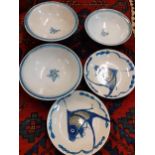 A mixed lot to include five glazed pottery bowls to include Chinese enamelled carp bowls, together