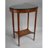 An Edwardian Occasional Table, Oval Form with Tapered Legs having Stretcher Shelf, The Table Hand