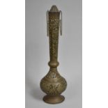 An Islamic Water Ewer with Pierced and Floral Decoration, 47.5cms High