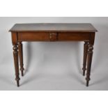 A Late 19th Century Mahogany Console Table with Turned Tapered Supports having Central Shield