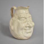 A 19th Century Creamware Novelty Jug in the Form of a Gents Head, Restored, 12.5cms High