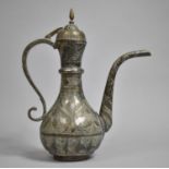 An Islamic Coffee Pot with Engraved Floral and Geometric Decoration