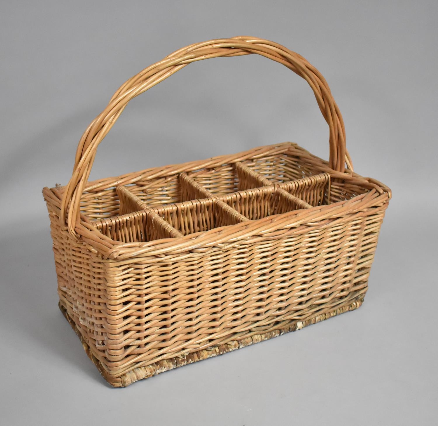 A Wicker Eight Bottle Carrier, 54cms Wide by 25cms High