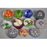 A Collection of Various Glass Paperweights