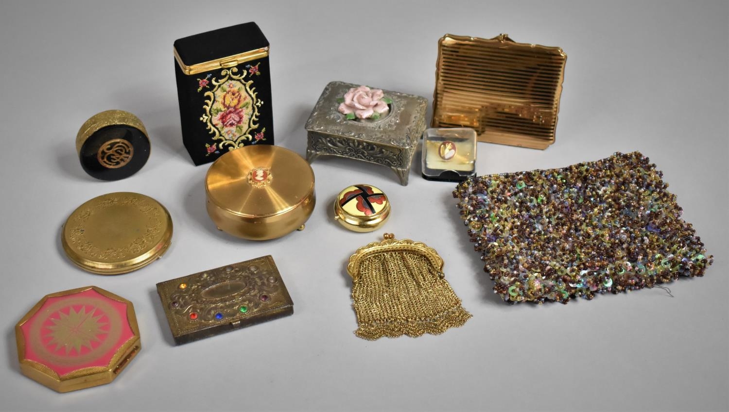 A Collection of Various Powder Compacts, Purses Etc