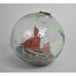 A Late 19th/Early 20th Century Glass Float Containing Sailing Boat Diorama, 40cms Diameter