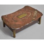 An Arts and Crafts Copper and Brass Cigar Box with Embossed and Studded Decoration, 26.5cms Wide