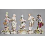 Three 19th Century Porcelain Candlesticks to include Pair Huntsman and Wife and Cherub Example,