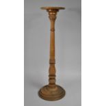A Turned Wooden Torchere Stand on Turned Circular Base, 75cms High