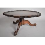 A 19th Century Mahogany Tray Topped Tripod Stand with Cabriole Supports Terminating in Claw and Ball