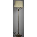 A Modern Brass Standard Lamp with Shade