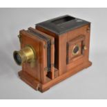 A Late 19th Century Mahogany Magic Lantern Complete with Brass Lens, and with Loss, 22.5cms High
