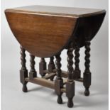 An Oak Barley Twist Drop Leaf Occasional Table, 70cms Wide, 51.5cms High