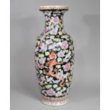 A Large Chinese Vase Decorated with Multi Coloured Enamels Depicting Red Dragon Amongst Foliage on