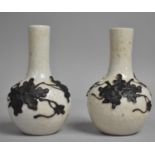 A Pair of Miniature Nanking Crackle Glazed Bottle Vases Decorated in Relief with Vines and Leaves,