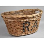 A Vintage Wicker basket, Monogrammed RA, 72cms Wide