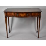 A Mahogany Side Table with Centre Pull out Drawer, Serpentine Front, Tapered Legs and String