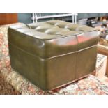 A Leather Effect Buttoned Footstool, 49cm wide