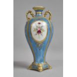 A 20th Century Blue and Gilt Two Handled Vase by Noritake with Painted Floral Panels, 27cm high