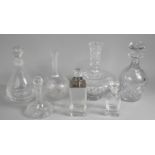 A Collection of Various Cut Glass Decanters etc