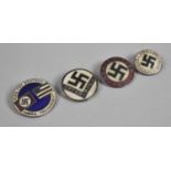 A Collection of Four Reproduction Nazi Badges