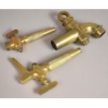 A Collection of Three Vintage Brass Barrel Taps