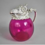 A Reproduction Novelty Silver Plate and Cranberry Glass Decanter with Hinged Ram's Head Lid, 19cm
