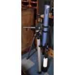 A Sky-Watcher Telescope on Tripod with Instruction Manual and Lenses