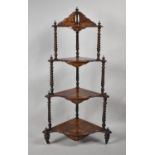 A Victorian Inlaid Walnut Four Tier Corner Whatnot with Tapering Barley Twist Supports and