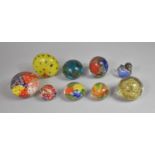 A Collection of Various Glass Paperweights to include Millefleur Style