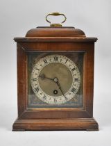 A Mid 20th Century Walnut Cased Bracket Clock, the Movement Stampe Coventry Astral, 27cm high