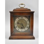 A Mid 20th Century Walnut Cased Bracket Clock, the Movement Stampe Coventry Astral, 27cm high