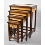 A Mid/Late 20th Century Nest of Four Oriental Tables with Carved Decoration and the Smallest with