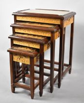 A Mid/Late 20th Century Nest of Four Oriental Tables with Carved Decoration and the Smallest with