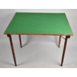 A Rectangular Beize Topped Table with Turned Folding Legs, 82x68cm