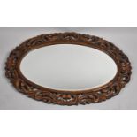 A Good Quality Edwardian Carved Oak Frame Oval Wall Mirror, 88x59cm Overall